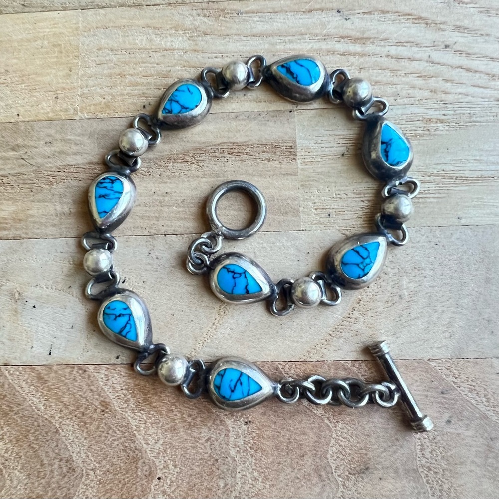 Vintage southwestern style 925 Sterling silver teardrop blue gemstone bracelet